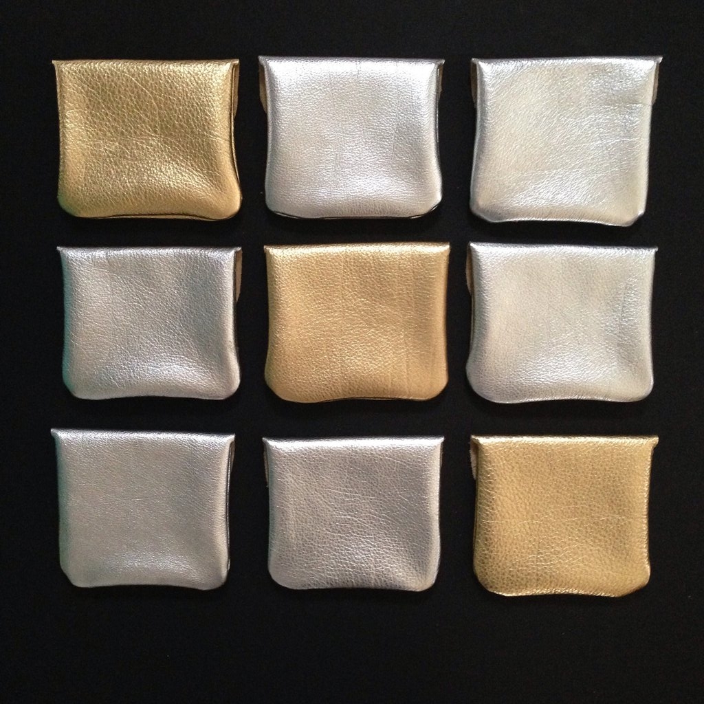 brioche silver and gold leather pouch with natural vegetable tanned wrap spring finn and co talin spring made in midwest