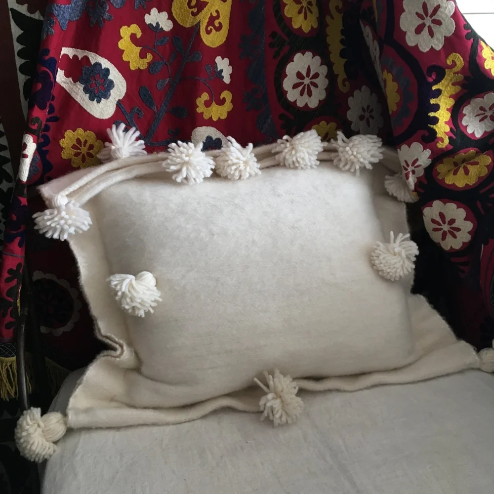 hand woven pom pom pillow
