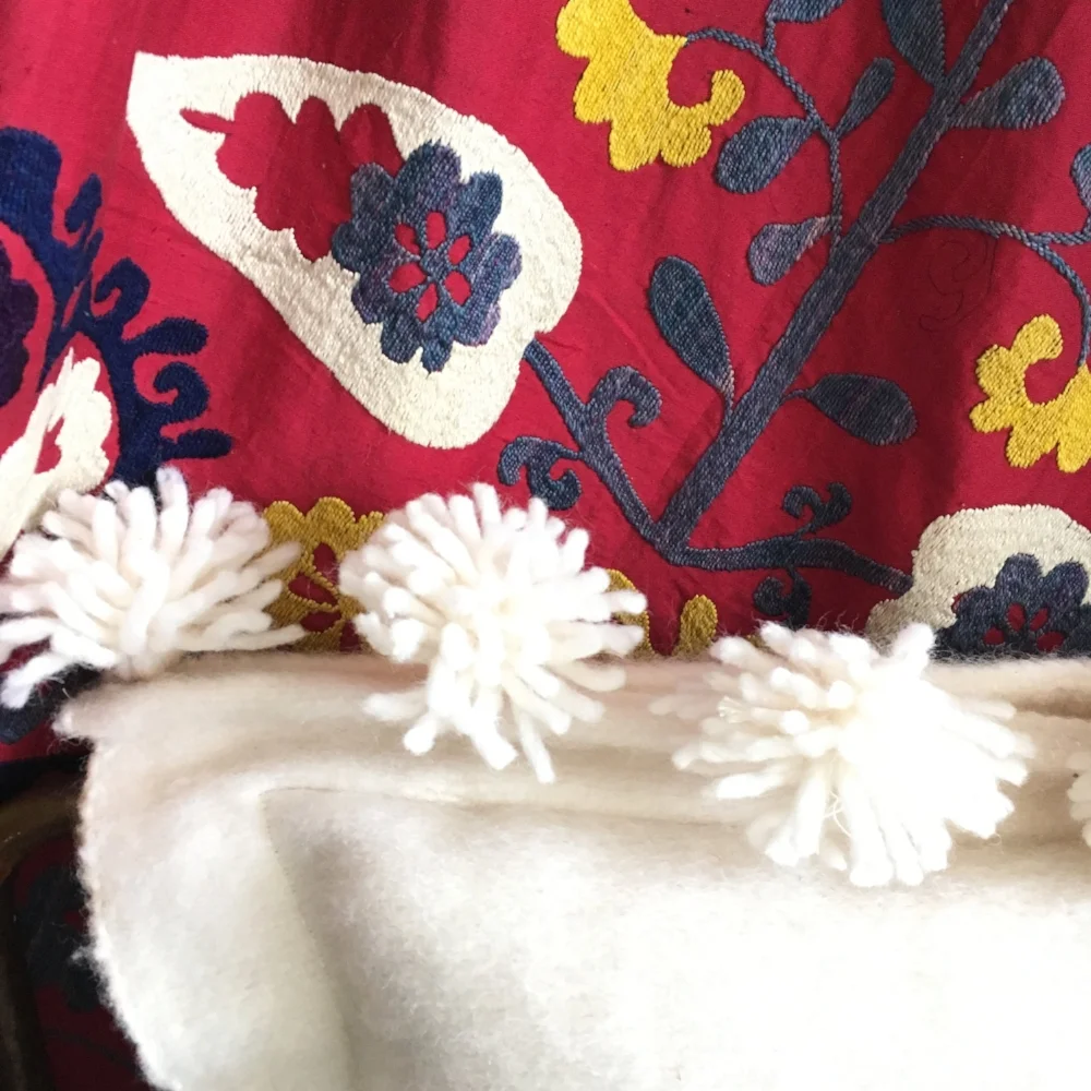 hand woven pom pom pillow
