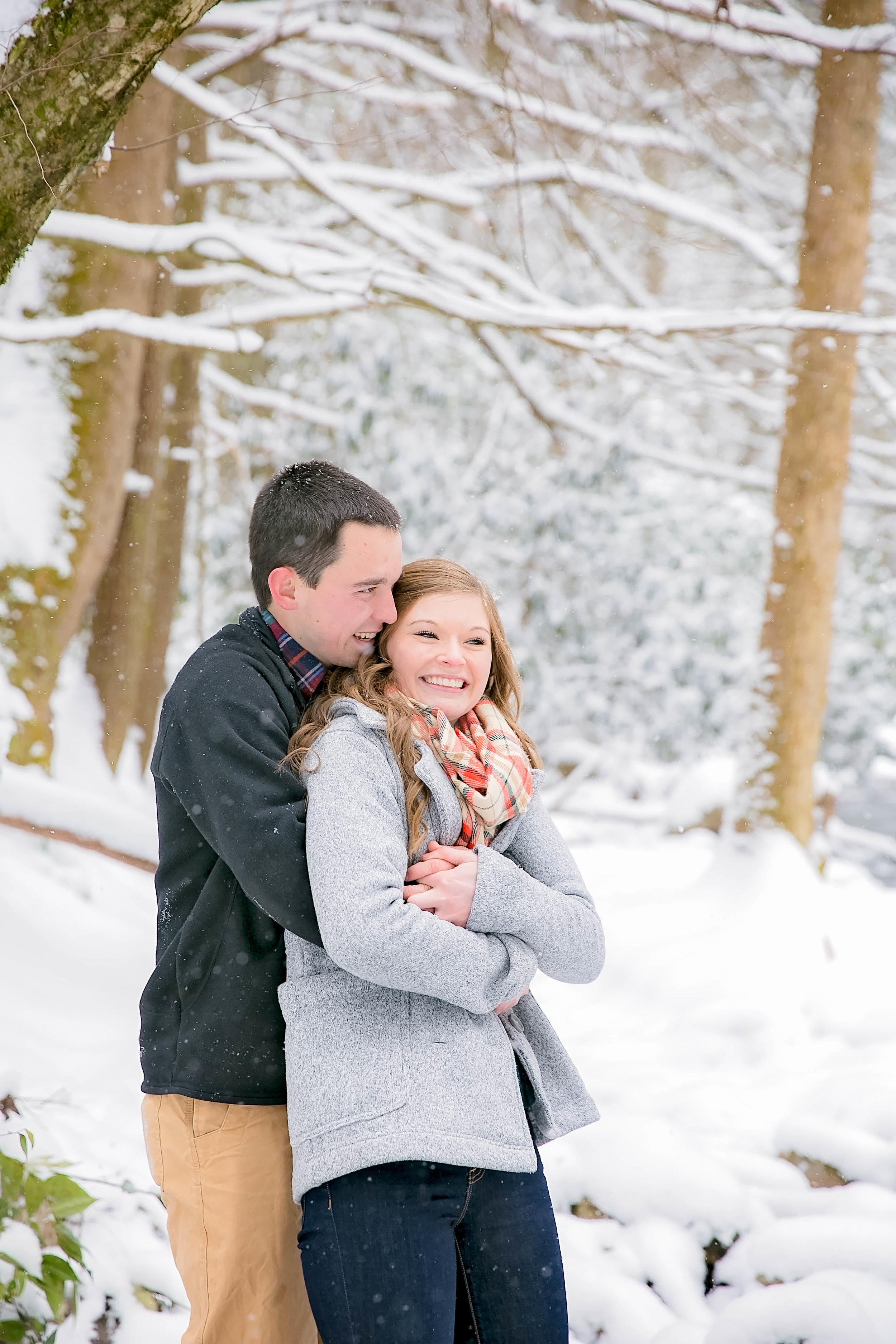 Laurel Falls hiking trail engagement session, romantic hike, East Tennessee snow engagement picture, Tri Cities wedding photography, Johnson City, TN photography, romantic couple in the snow