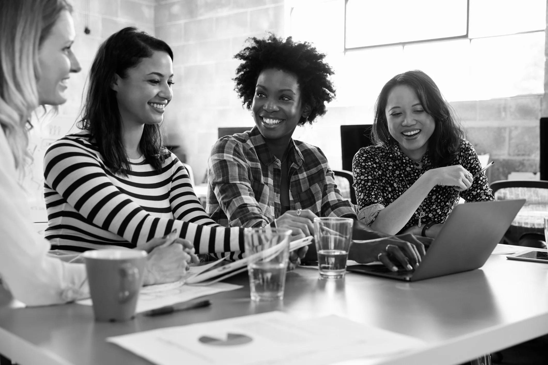 Group-Of-Female-Designers-Having-Meeting-In-Modern-Office-502394440_2125x1416.jpeg