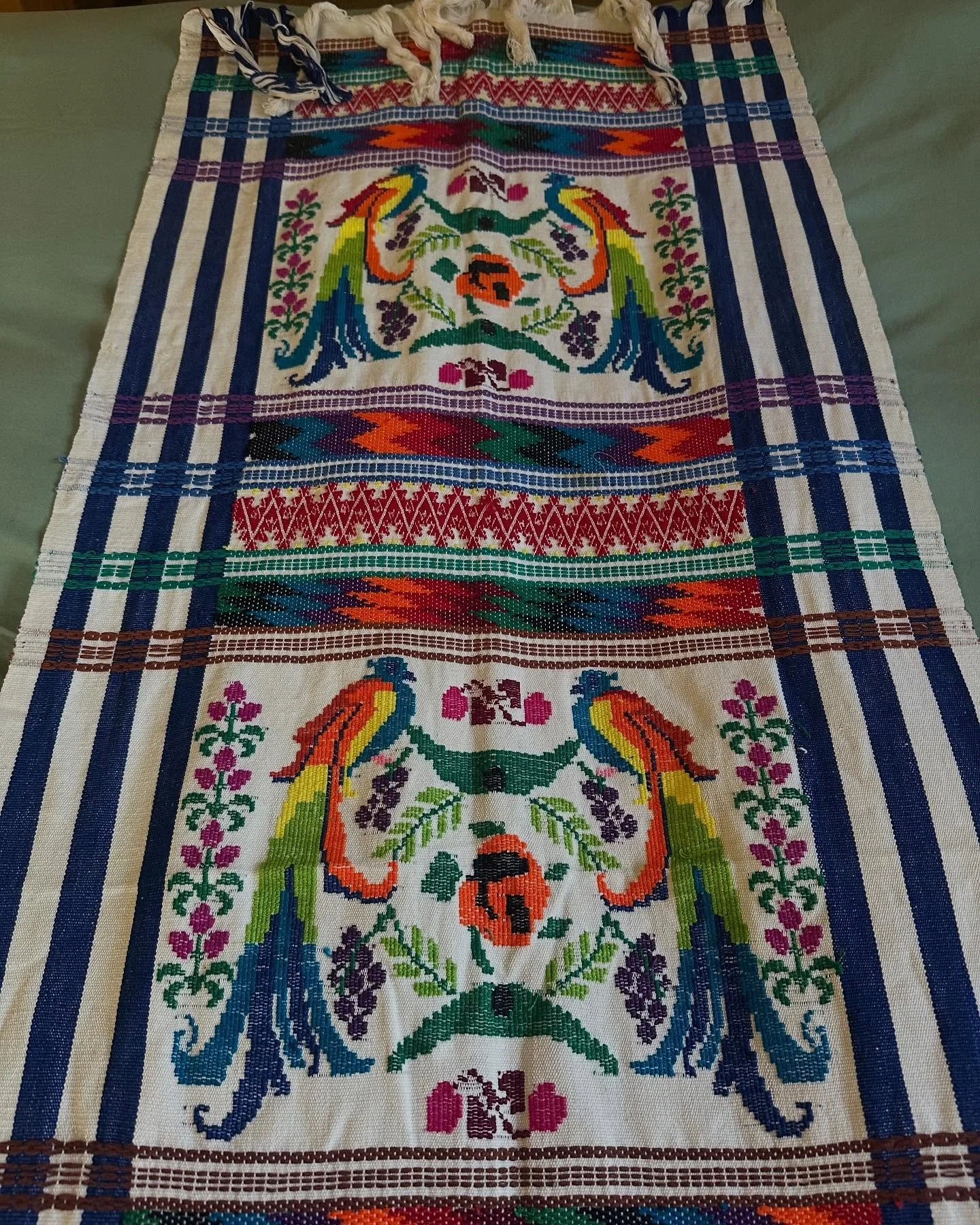 This vintage table runner from the 1990s was handwoven on a backstrap loom. It features a striking design of the quetzal, Guatemala&rsquo;s emblematic bird, known for its splendid plumage that was treasured by the ancient Maya. #Guatemalan #Guatemala