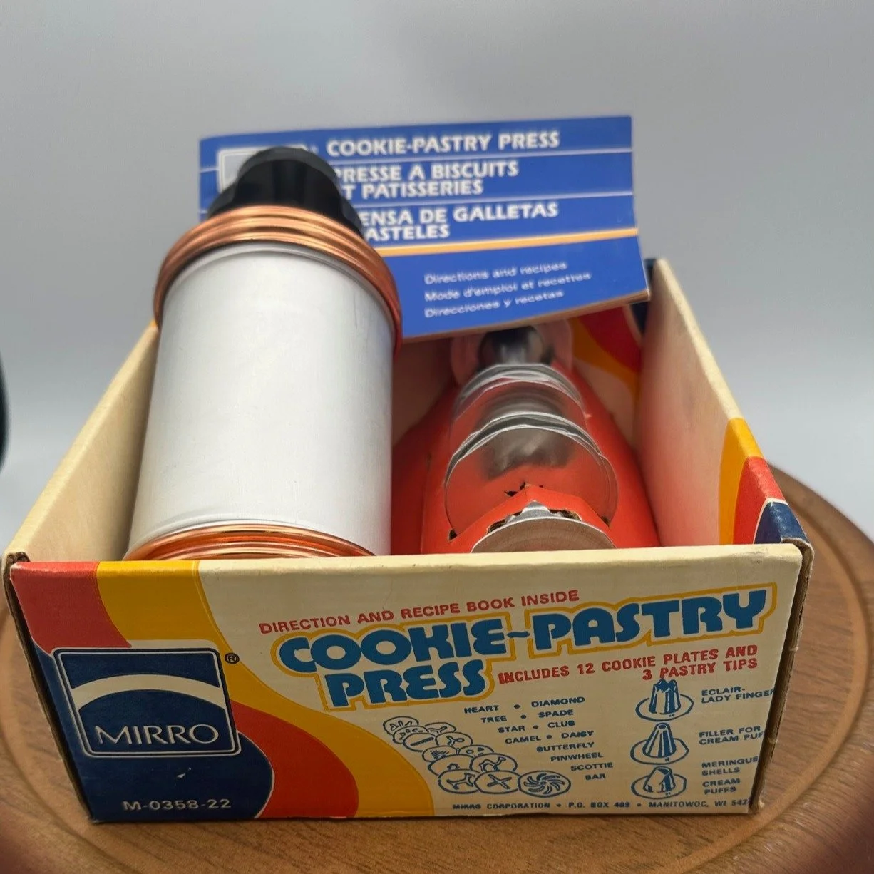Flashback Friday! Does anyone remember using one of these when they were younger? They still work as well today as they did in the 1960s! #vintagecookies #cookie #60s #1960s #60scooking #cookiedecorating #cookiepress #pastry #pastrychef #retrocookies