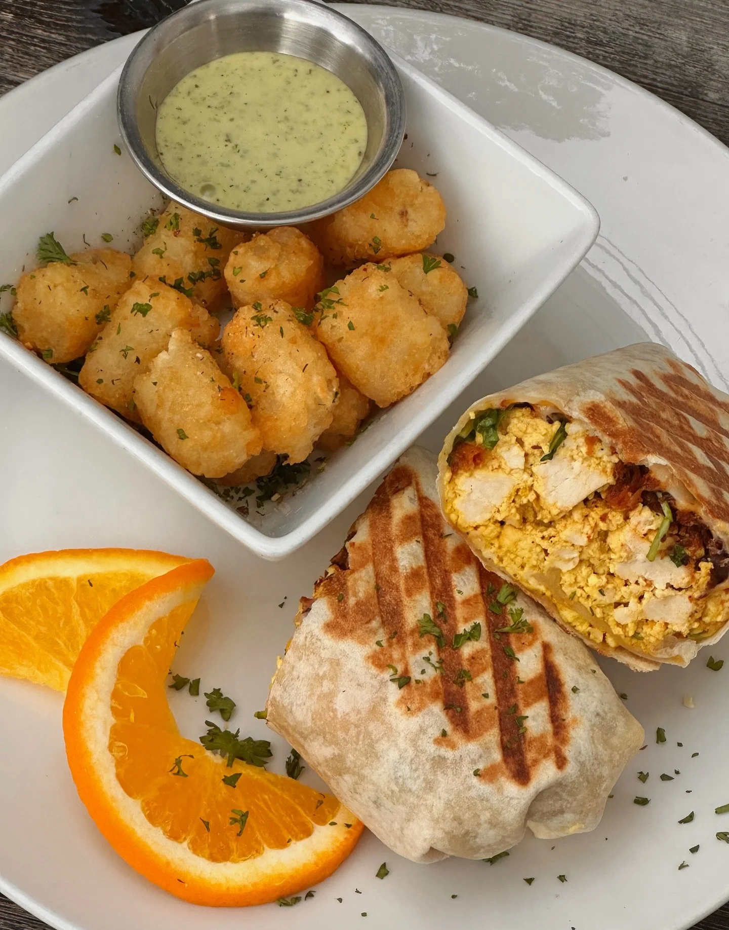 SATURDAY SPECIAL: tofu breakfast burritos served with seasoned tots and lemon basil aioli 😝