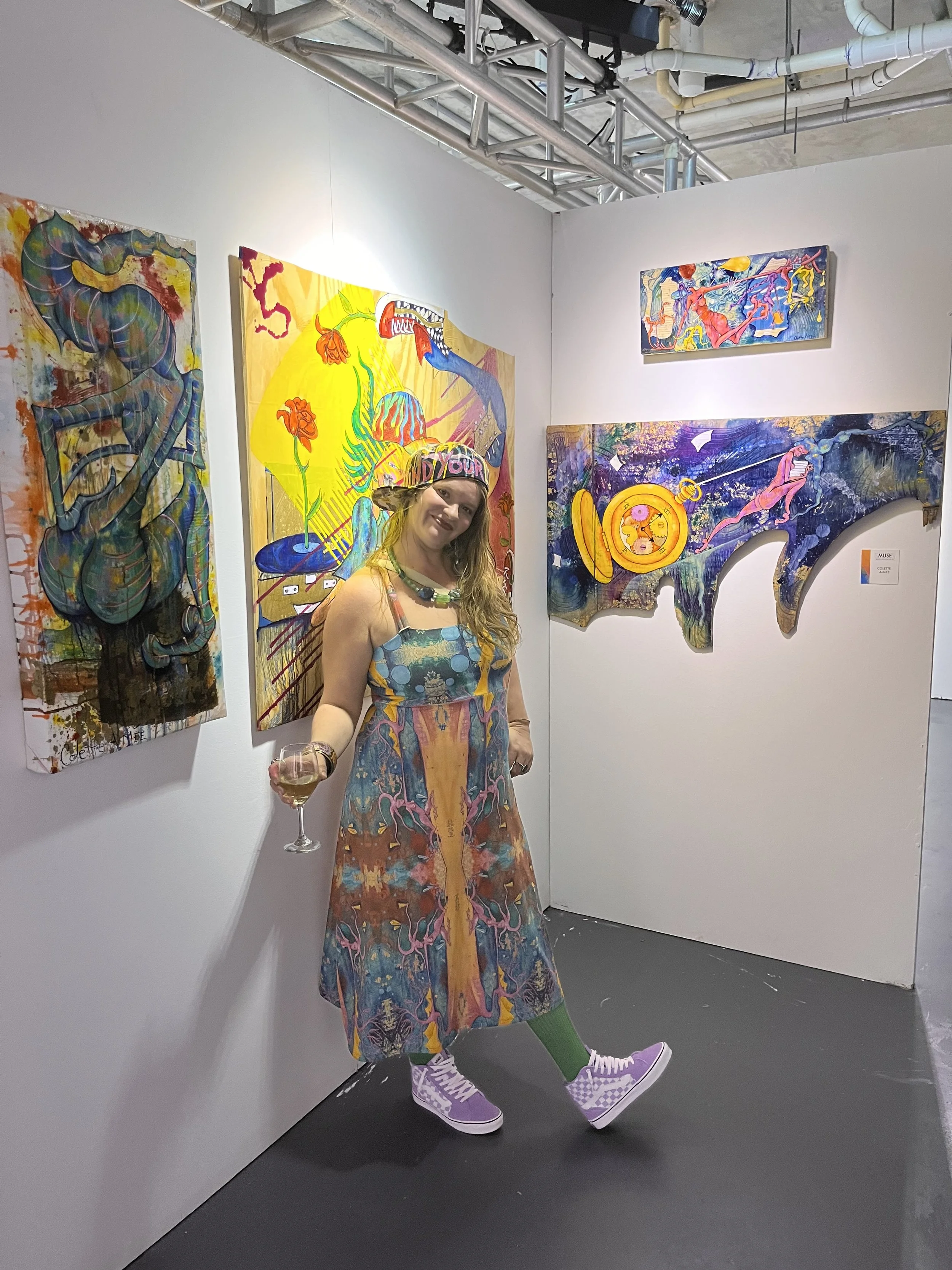  Colette Aimée Standing in front of her exhibition at Muse Gallery, in Miami. December 2022 