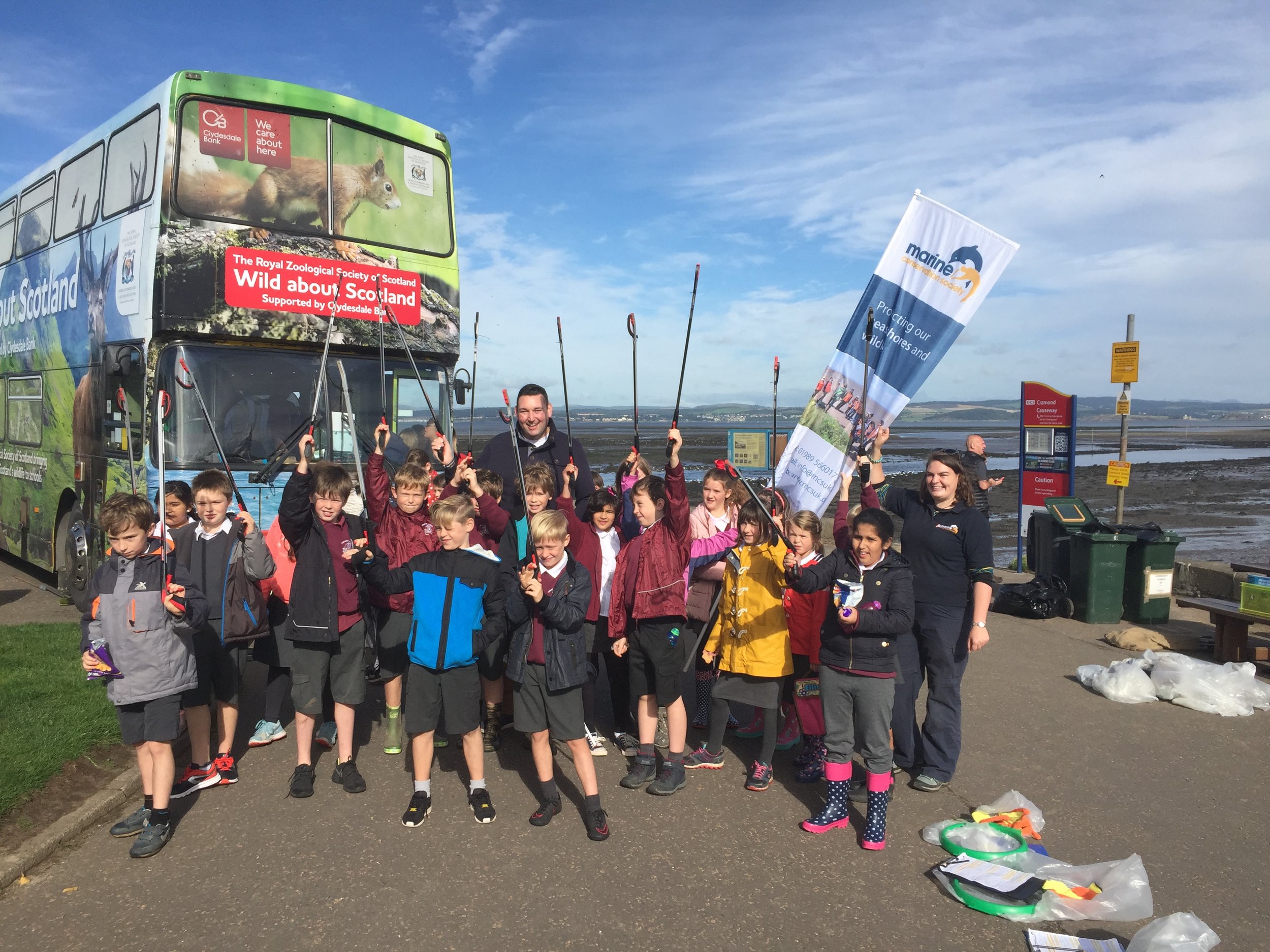 Miles with pupils from Cramond Primary School preparing to clean up Cramond Beach