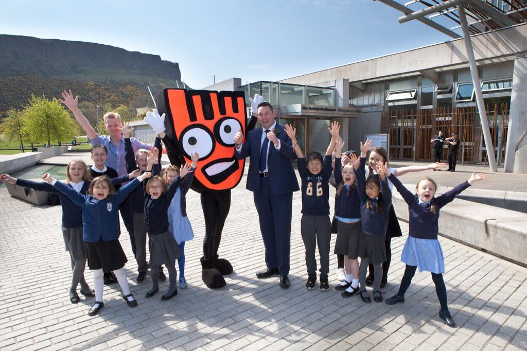 Miles with pupils from Abbeyhill Primary School promoting safe journeys to school.