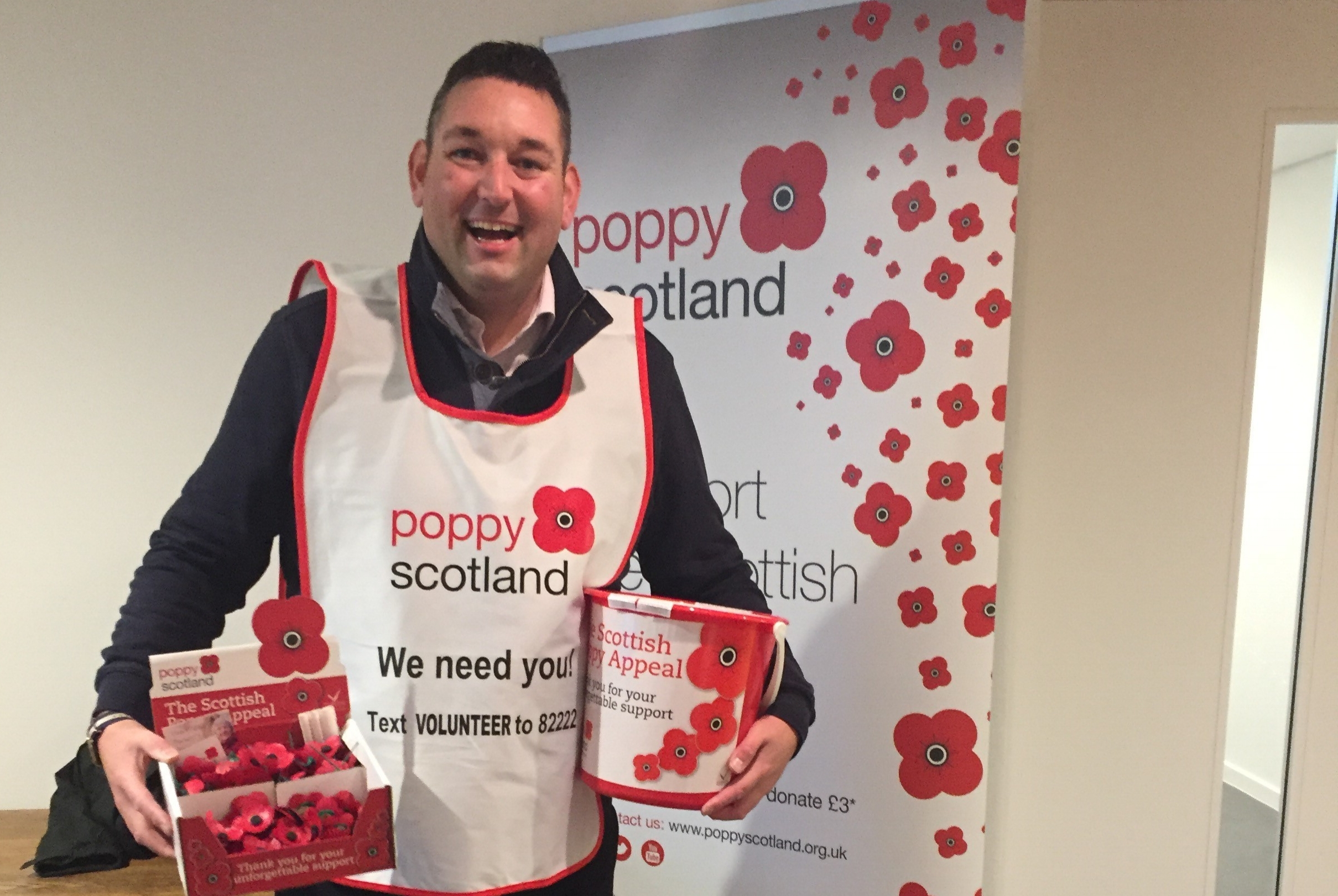 Miles collecting money for Poppy Scotland