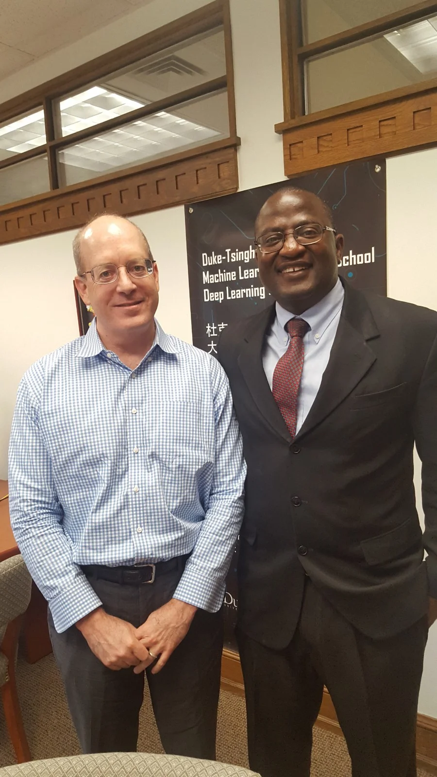 Duke Vice Provost of Research and University Vice President, Dr. Lawrence Carin (Left) with RETINA-AI Health, Inc Founder, CEO, and Chairman of the Board, Dr. Stephen Odaibo (Right)