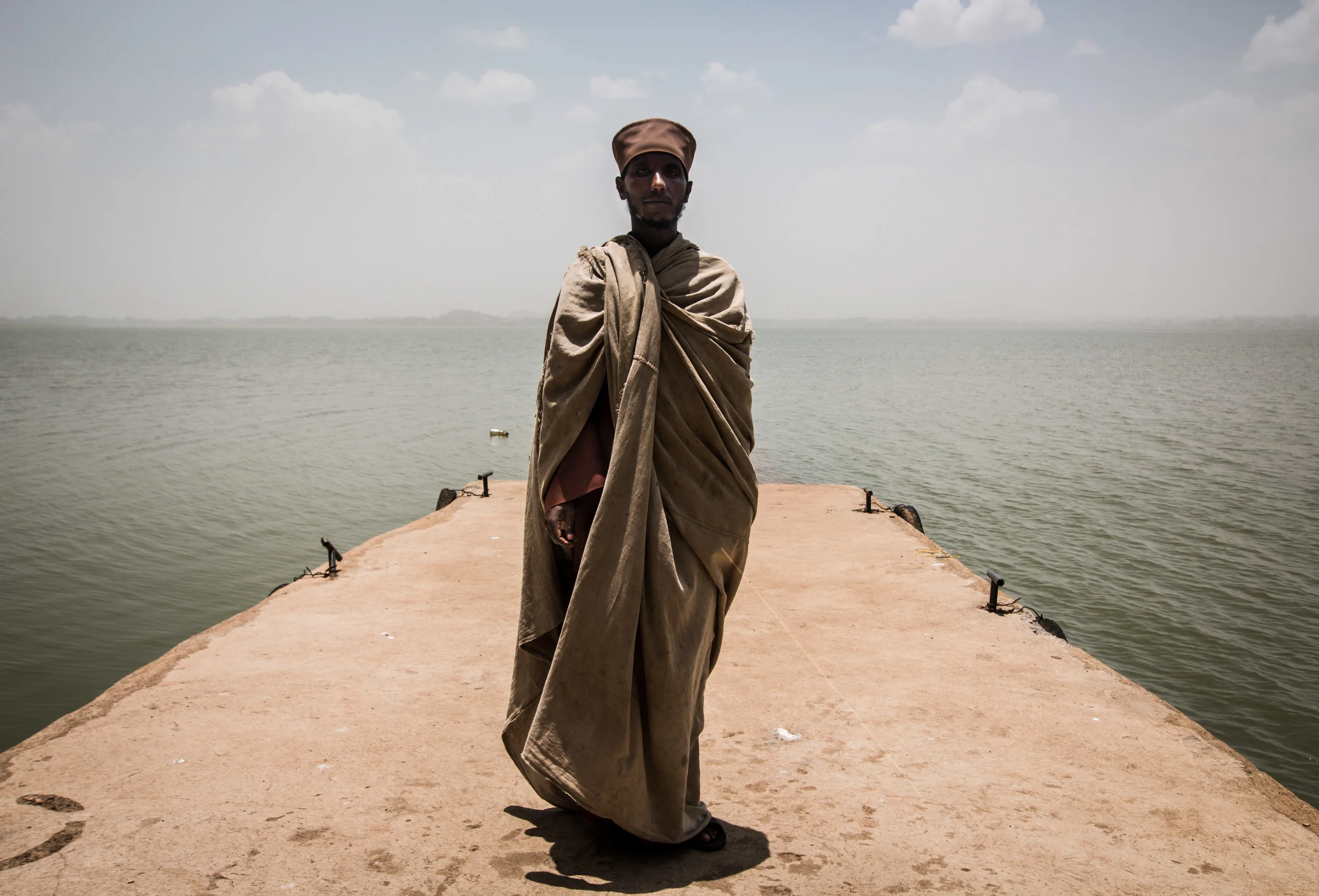 A monk who shared some delicious injera dipped in chilli spice with us on this island monastery.