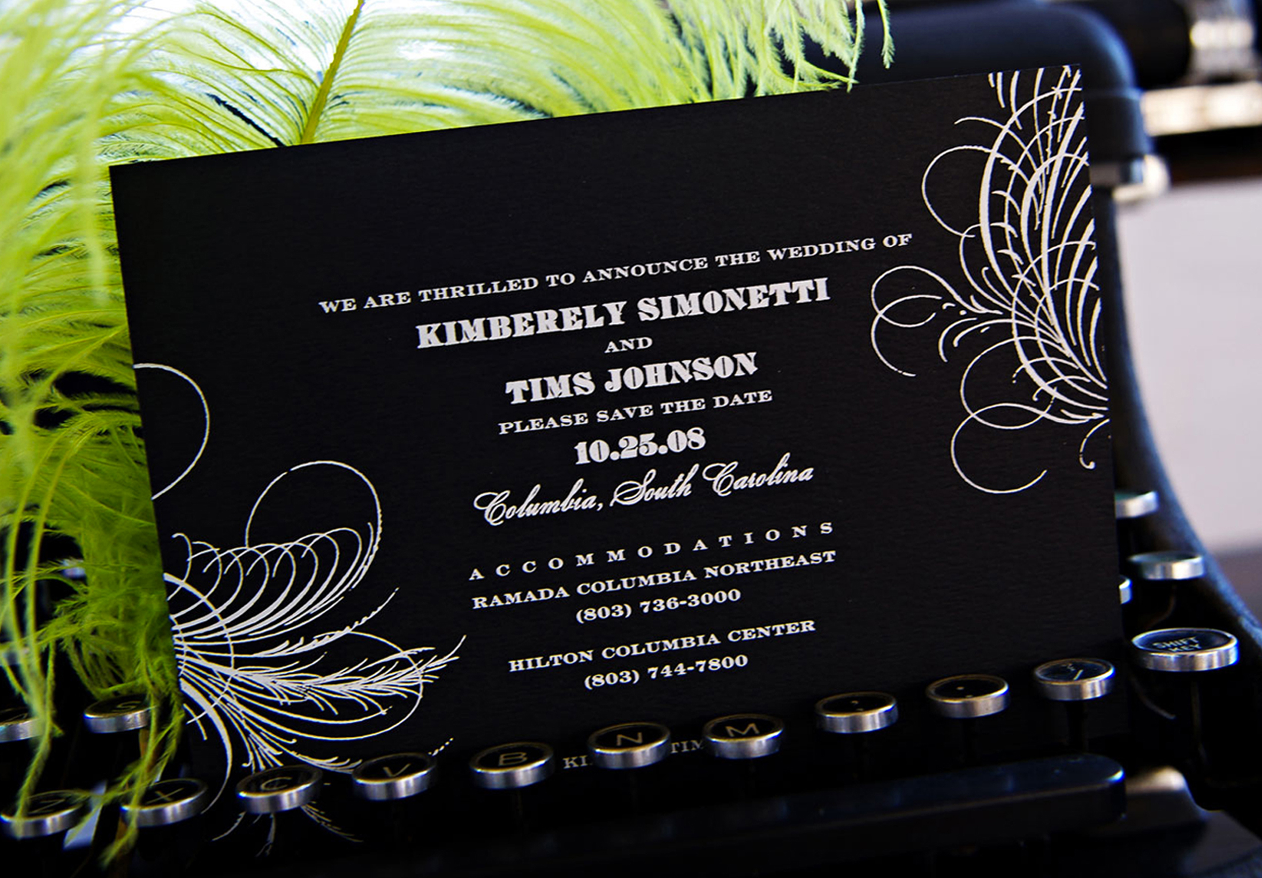 Foil pressed save the date. Matte white foil on black felt weave paper.