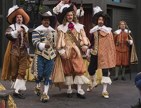 Marcus Truschinski takes centerstage with other elegantly dressed Marquises in Cyrano de Bergerac at American Players Theatre.