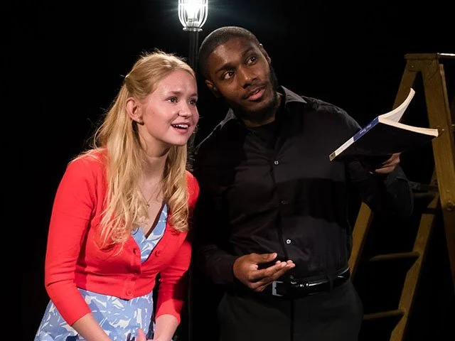 Emma Bahnson (Emily) and Denzel Taylor (The Stage Manager) in the UW Theatre Department's production of Our Town . 