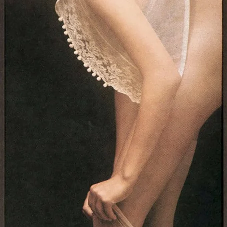 10-Cecilia-Putting-On-Her-Stockings_David_Hamilton.jpg