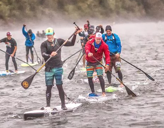 Steven Barry (lead paddler wearing black and green) at Chattajack 31. Steven will be hosting a SUP paddling clinic to help you improve your stroke efficiency and speed.