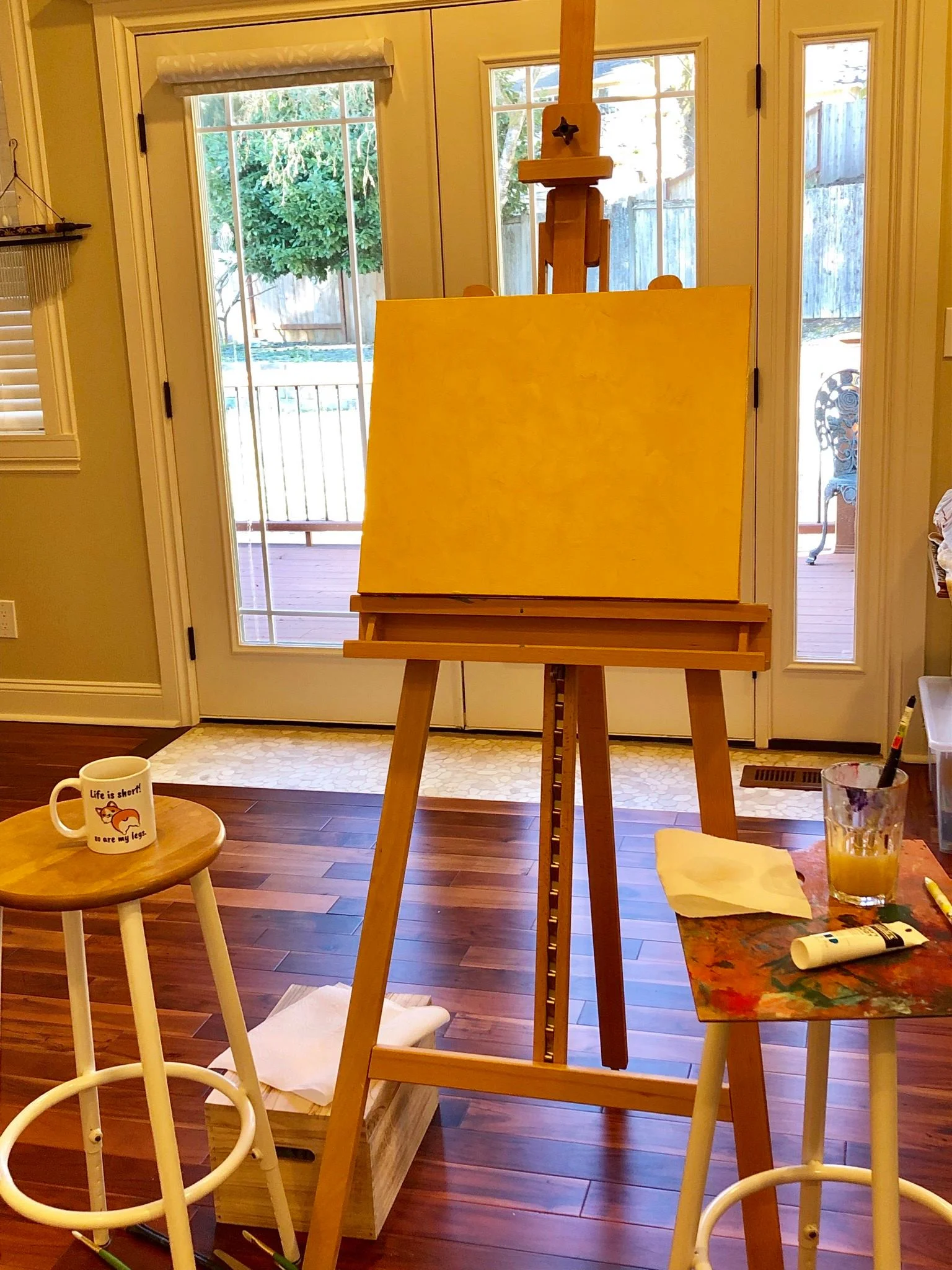 Best morning view ever. Also, you’ll notice my adorable corgi mug to the left and the classy 90s stools flanking the canvas.