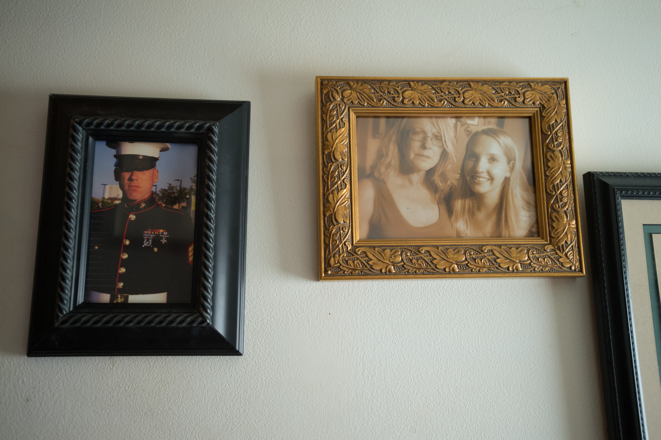  Photos of Carol's two children, Gabe Sloan and Margaret Elizabeth are among many wall hangings at Carol's house. 