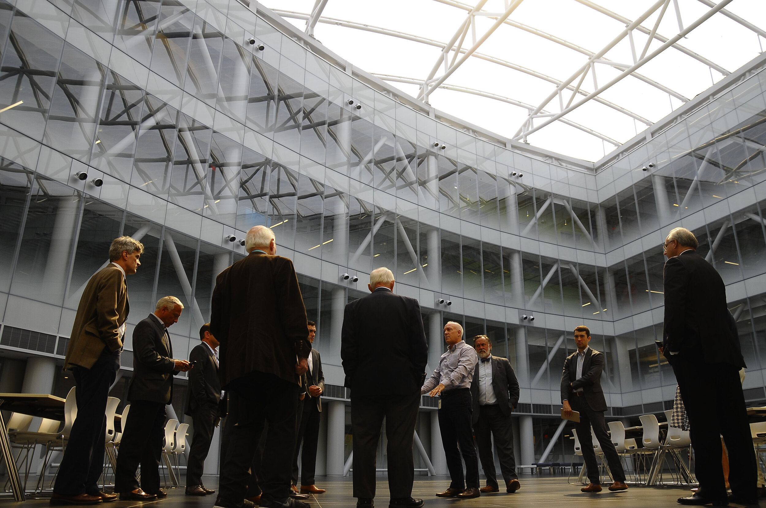  Michael Fancher, center, Director of New York State Center for Advanced Technology in Nanoelectrics, shows the Zen Building to the Economic Development tour hosted by Saratoga County Prosperity Partnership at SUNY Poly Technical Institute on Monday,