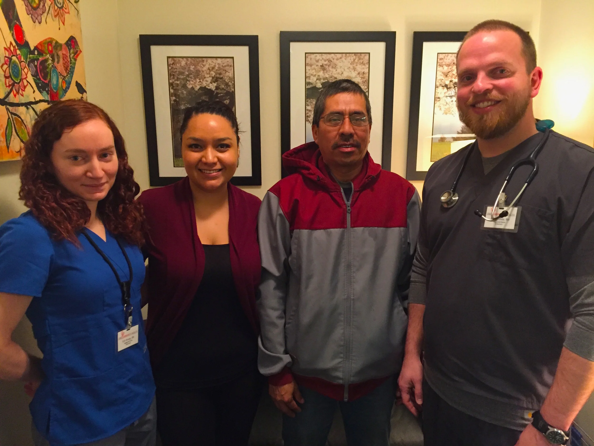 One Community Health's "Pink Team" stepped up and provided speedy, high-quality care for Inocent Giles. Shown here (left to right): Erin Krupp, RN, Flor Meza (team assistant), Inocente Giles, patient, and Adam White, RN.