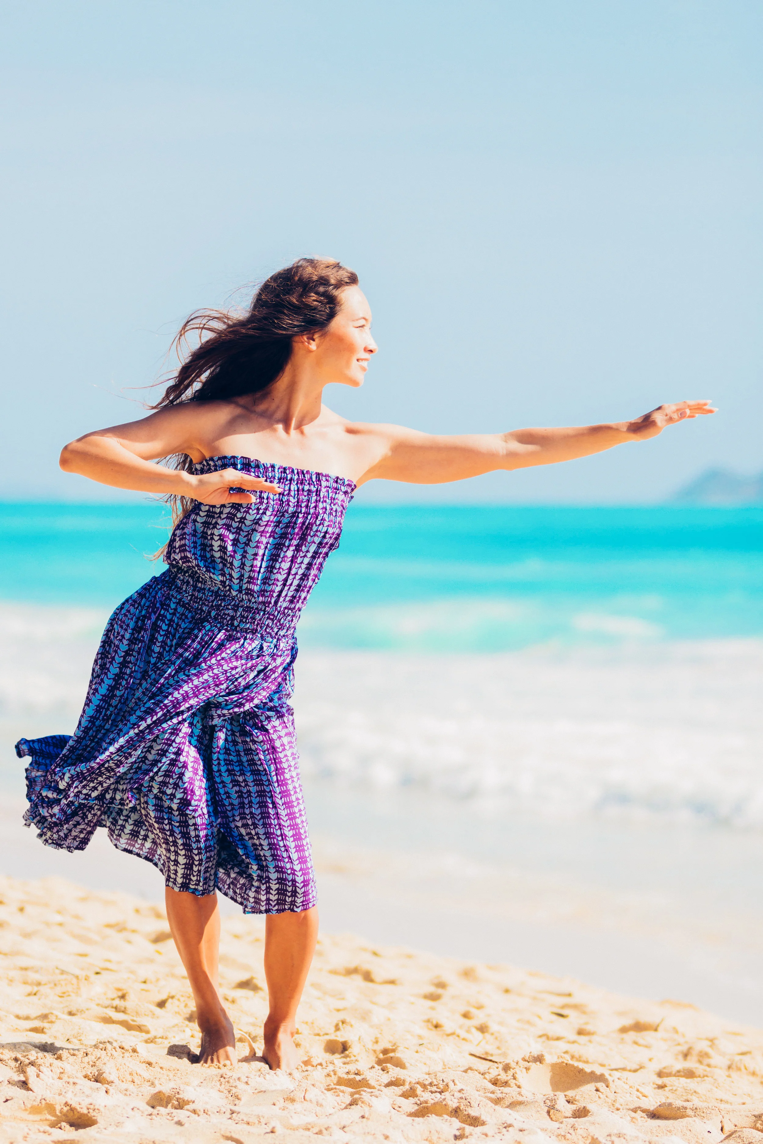 The Hula Dress is an easy and effortless way to put on a dress and walk out the door. The lightweight rayon voile dress features an elasticated waist and tube top with breezy fly away panels. This dress is popular with hula halaus and can be special ordered for larger quantities. $159.00