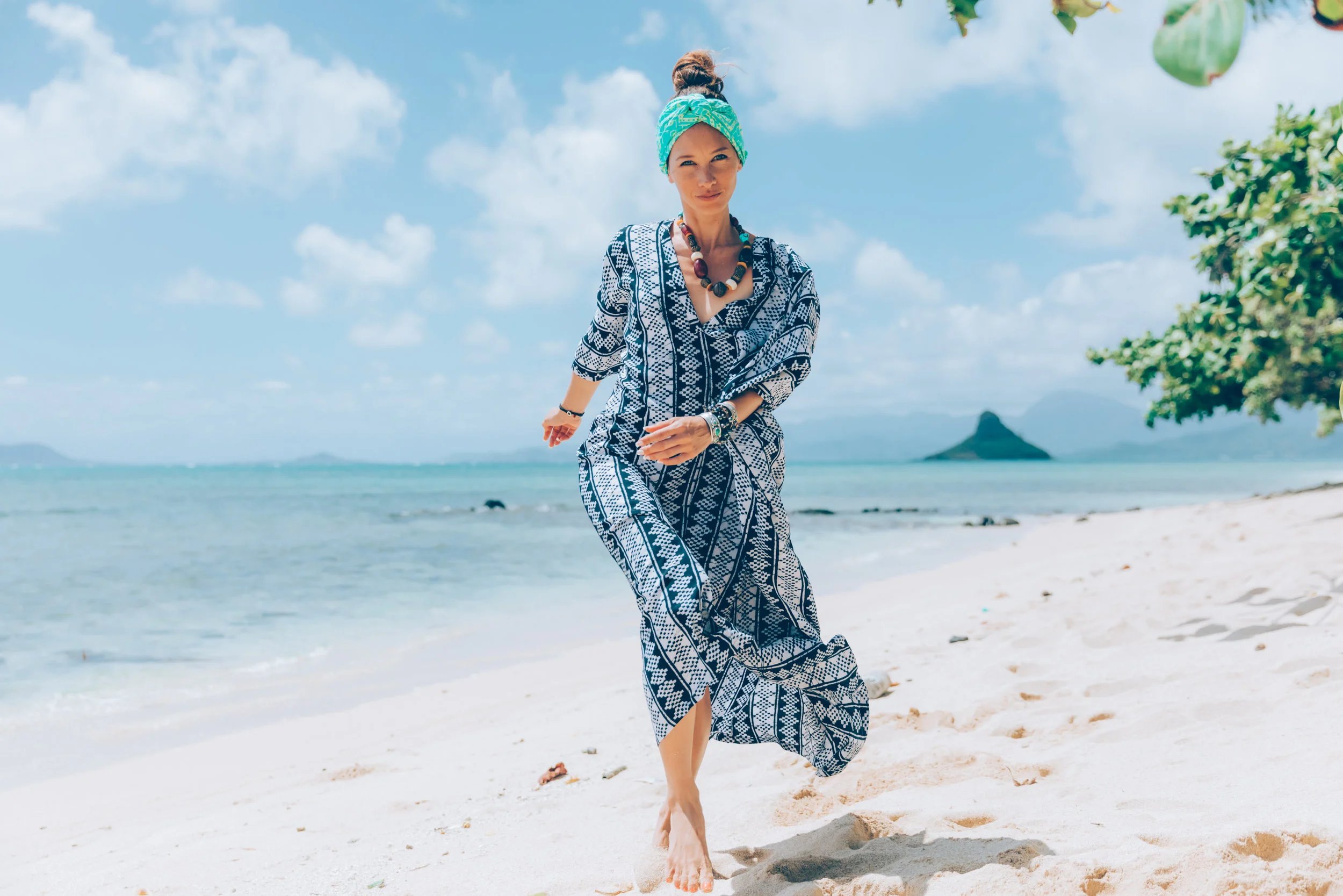 The Rajah is our take on the classic caftan style. Made of lightweight natural fiber Rayon, this is the ultimate elegant yet comfortable style for all ages and body types. Loose fitting, lightweight and beautiful. Plunging V neck and front slit that can be tied to create a dramatic draping effect. Sizes S-L. $159.00