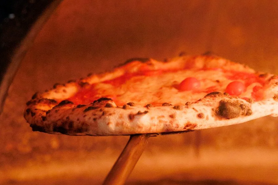 woodfired pizza in authentic oven.jpg