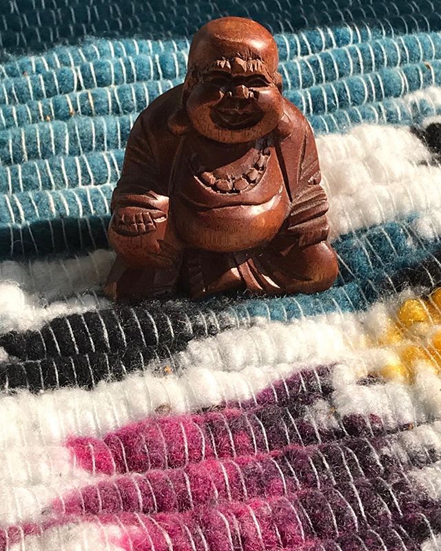 “Buddha on a blanket in the sun” copyright 2019 Cleveland Edits