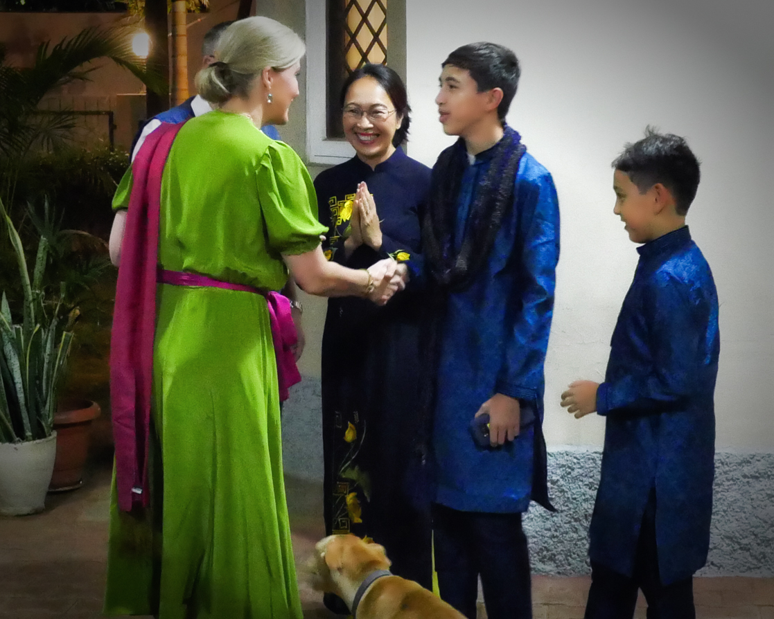 Andrew, Van, Alex and Arran Fleming, together with their rescue dog Muni, welcome Sophie, Countess of Wessex to their home for the reception.