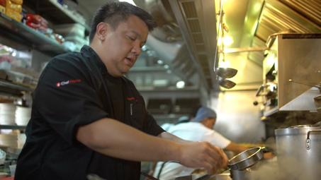 Madrid Fusión Manila 2017 chef-presenter Robby Goco (left) of Green Pastures prepares a rice salad dish