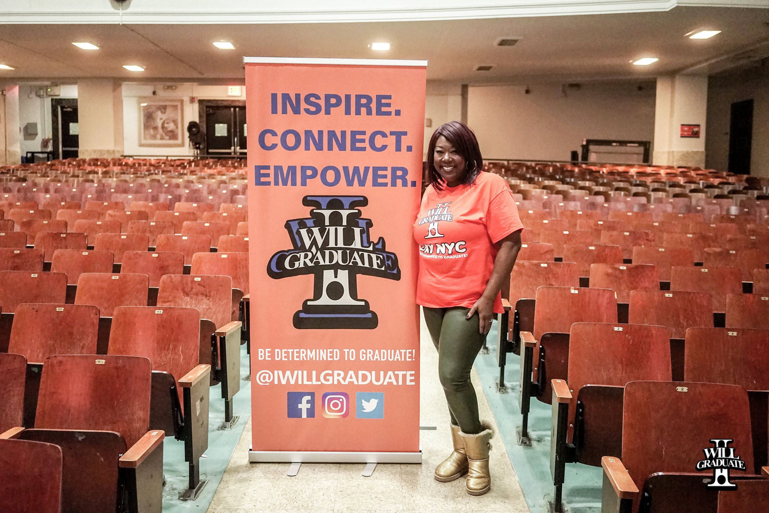 Executive Director Tónya Lewis Taylor standing next to I WILL GRADUATE mission statement