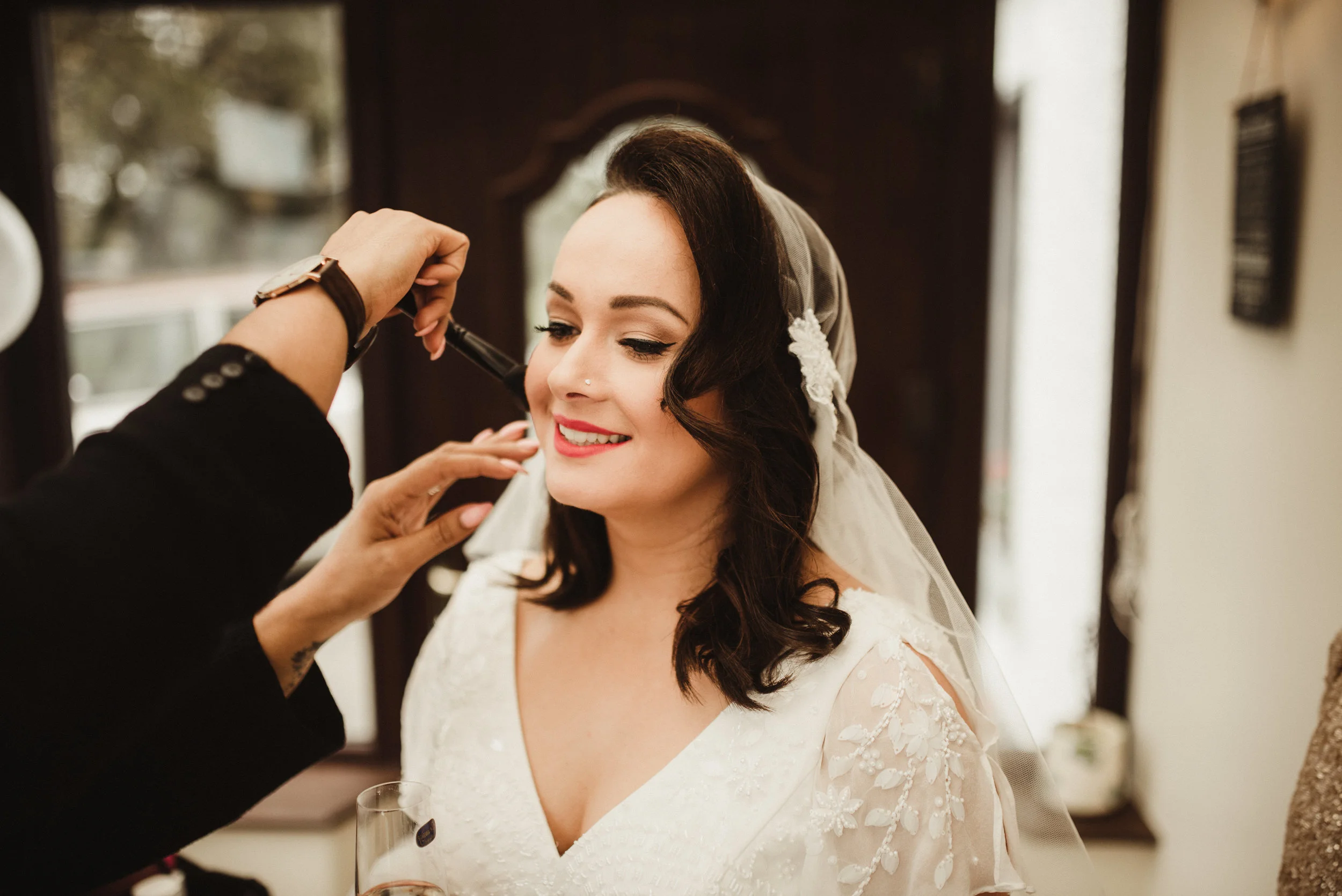 Joanne was going for a quite a vintage look, so we kept the makeup quite clean with a classic liner and red lip finish. 