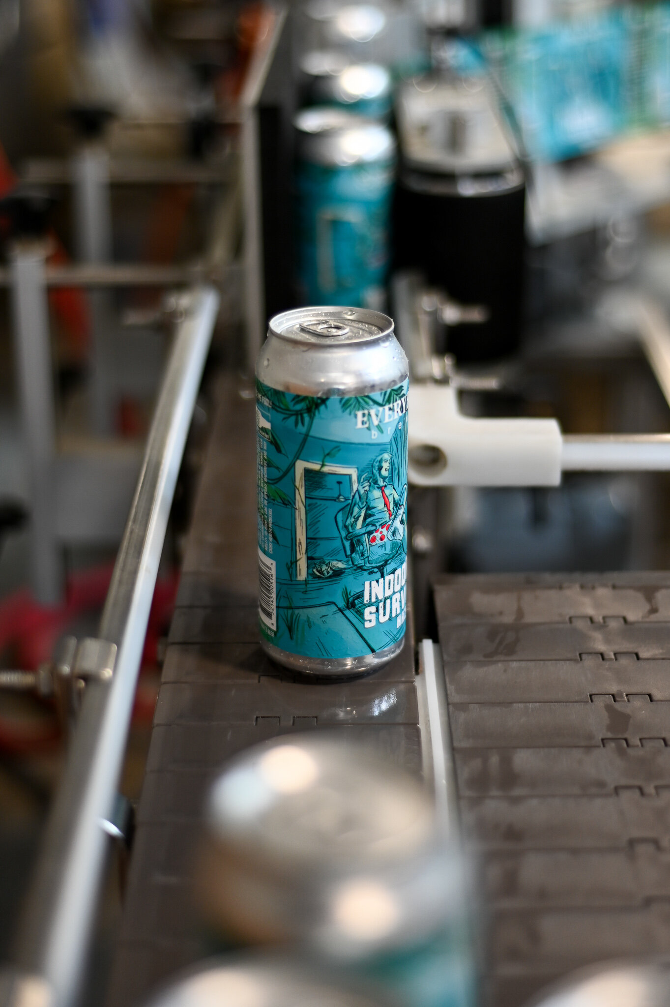 Everybody's Brewing Indoor Survival Hazy IPA Coming Down Canning Line.jpg