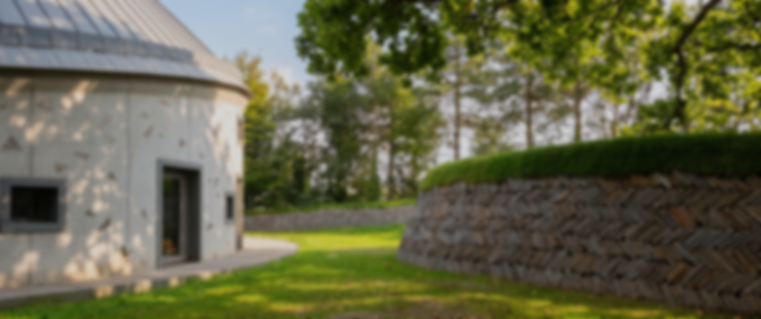therapeutic garden design with herringbone slate and a turf bank in UK