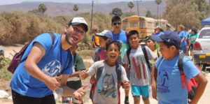 summer camp_counselor with kids.png