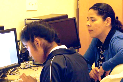 dclc_esther torres_child on computer.png