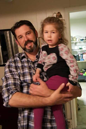 amelia with her dad.png