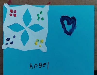 This was one of the older kids, I was amazed by the beauty of the touch of color he added to his snowflake. I said, "You are an artist!" and he smiled shyly. Later he came back to show me another thing he'd drawn and truly surprised by his creativity I said, "You really are an artist!" "I know," he said with a smile.