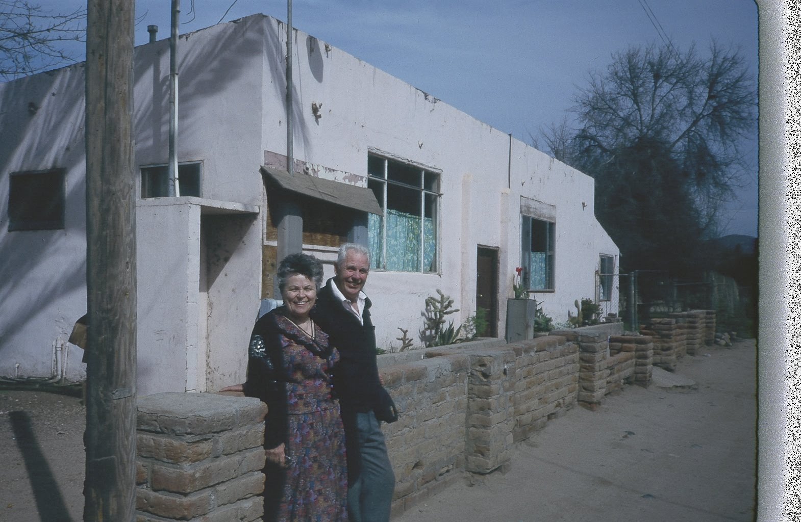 chuck and charla in front of old soup kitchen (1)[5].JPG