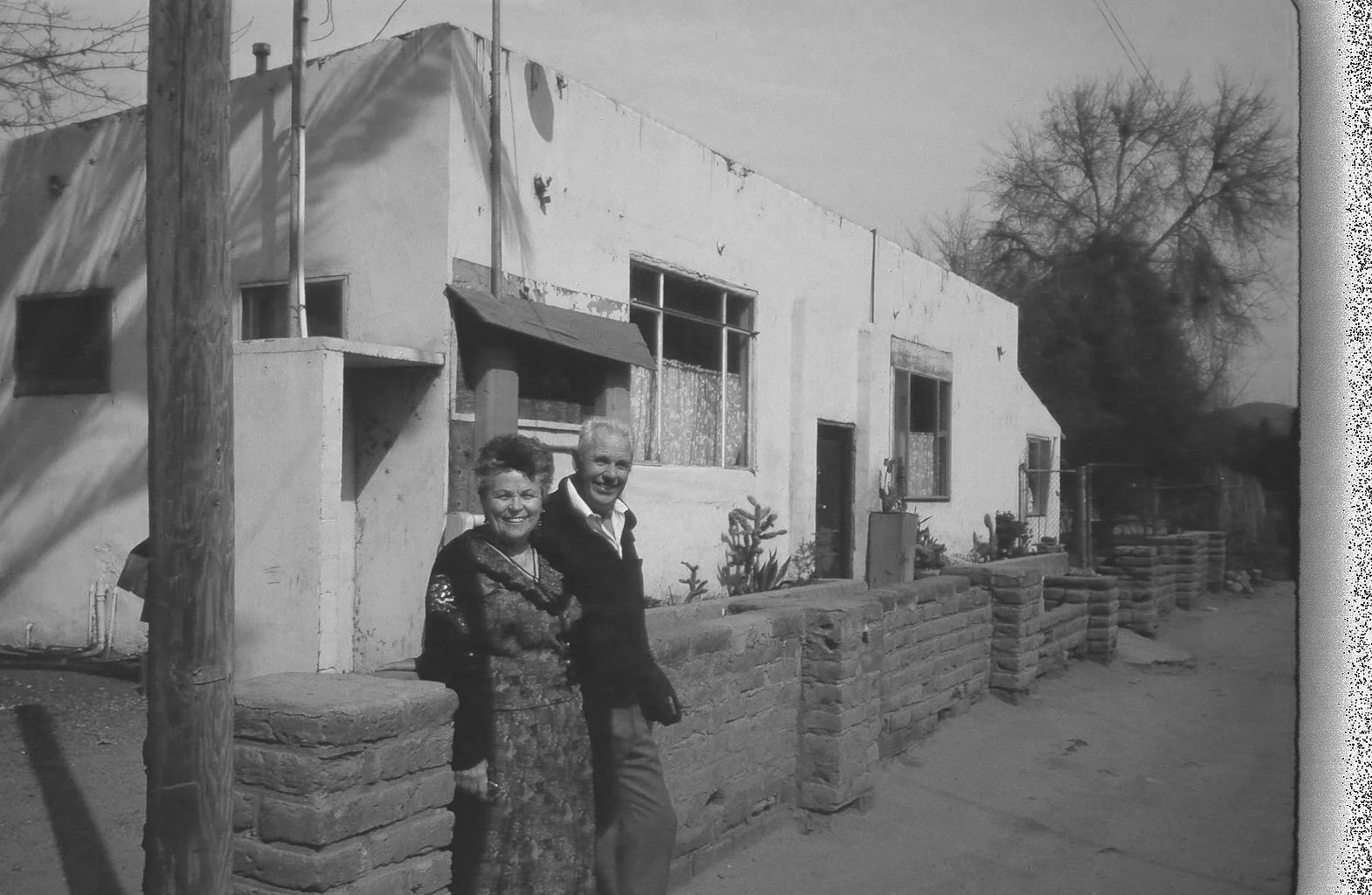 chuck and charla in front of old soup kitchen (1)[5].png