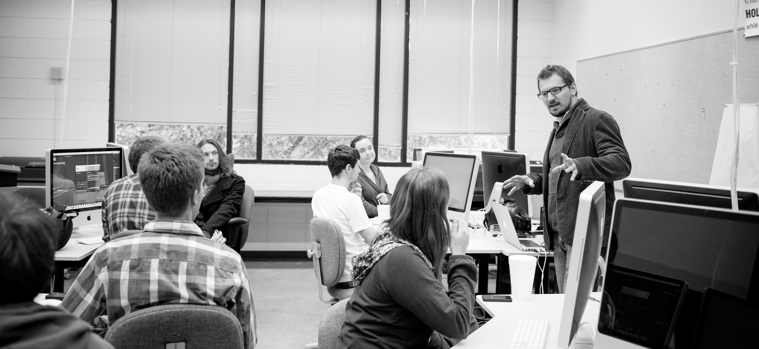 Professor instructing user experience course.