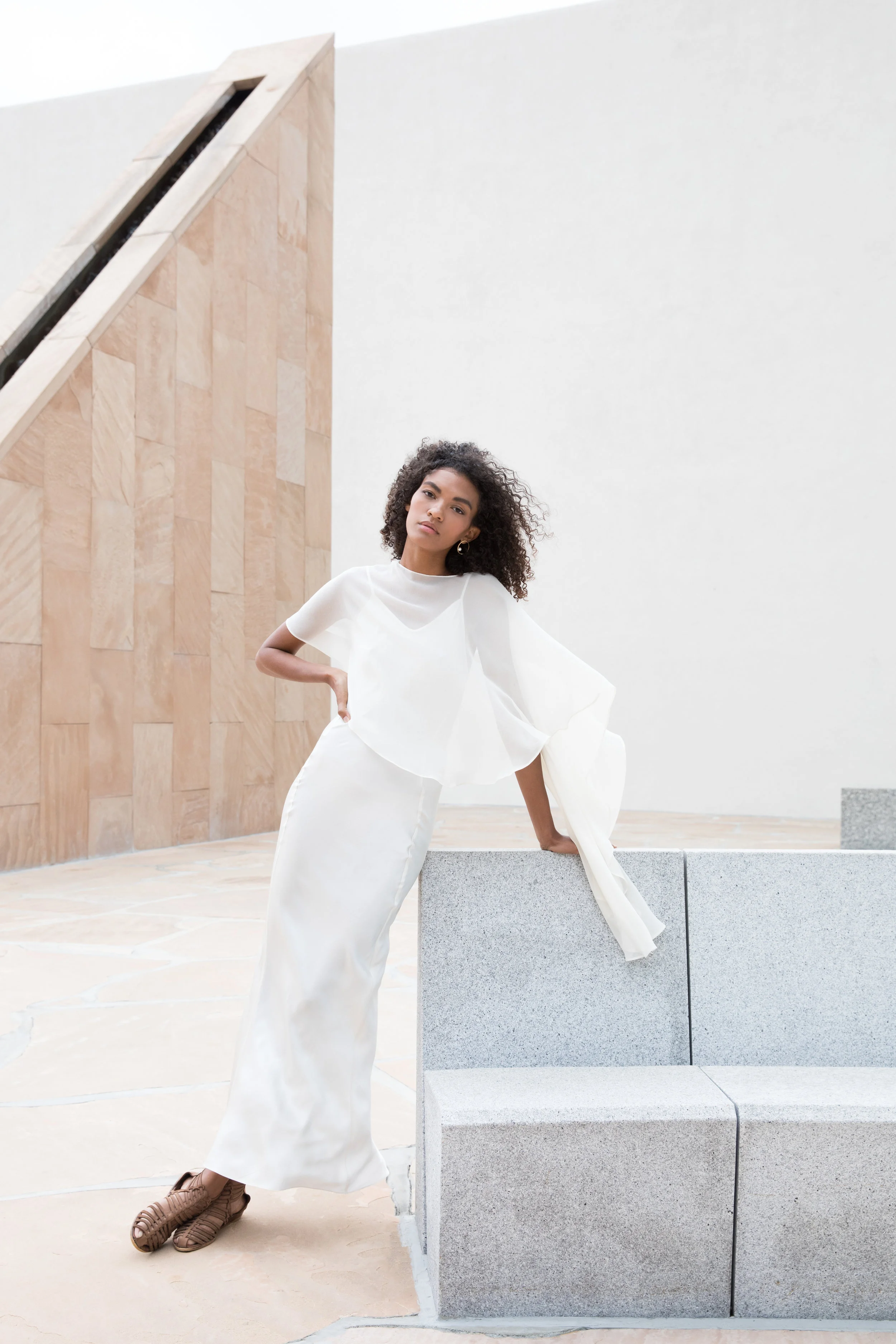 VANESSA OUMA in a bias cut Seam Front Slip and Short Cape Shawl