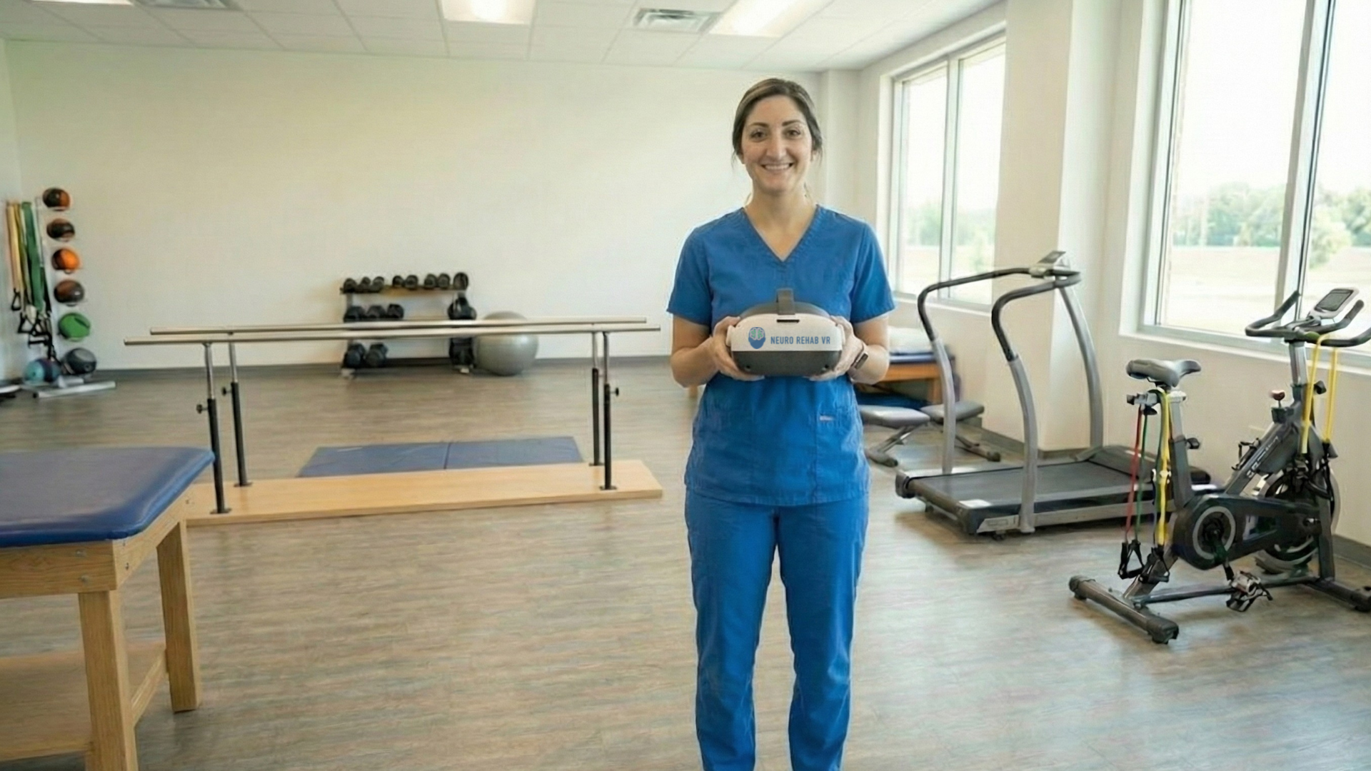 Physical Therapist holding the Smart Therapy Solution