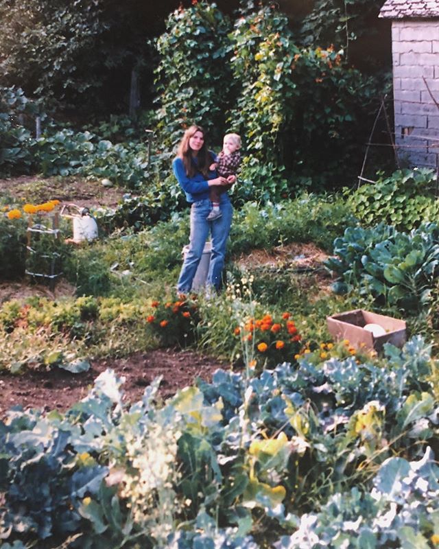 My mama with my brother in her garden. Cougar, Washington 1982.