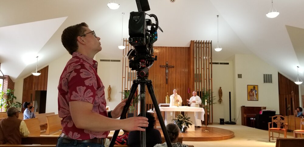 Filming Sunday Mass at Holy Child Jesus Church with Bishop Joseph Kopacz and paster Father Guy Wilson presiding.jpg