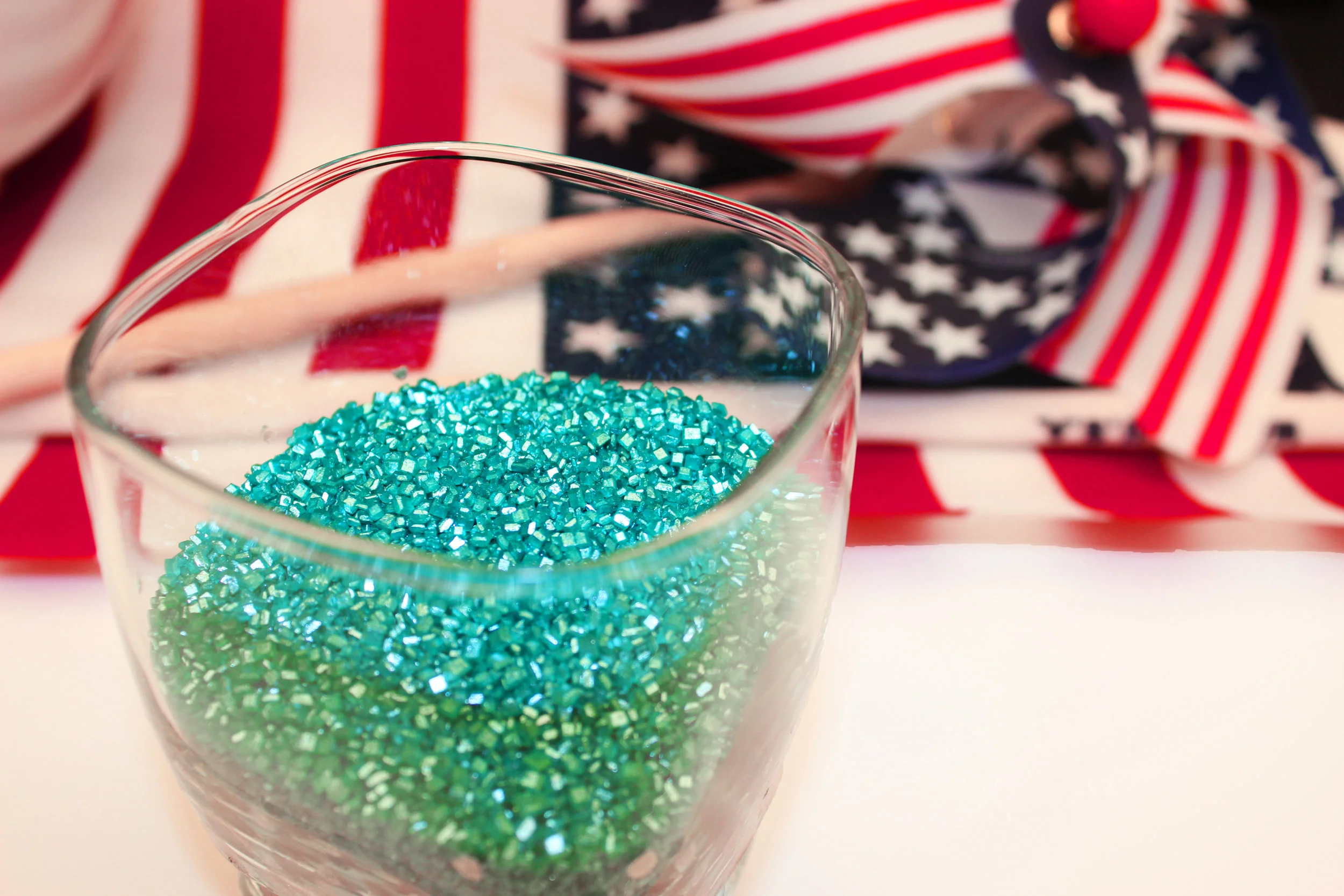 2. Place blue sugar in small cup