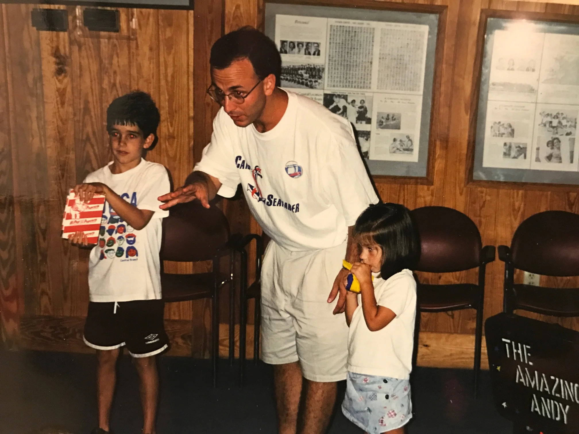  While serving as a volunteer physician at Camp Seafarer every summer, Andy always finds the time for a little magic with the kids.&nbsp; 