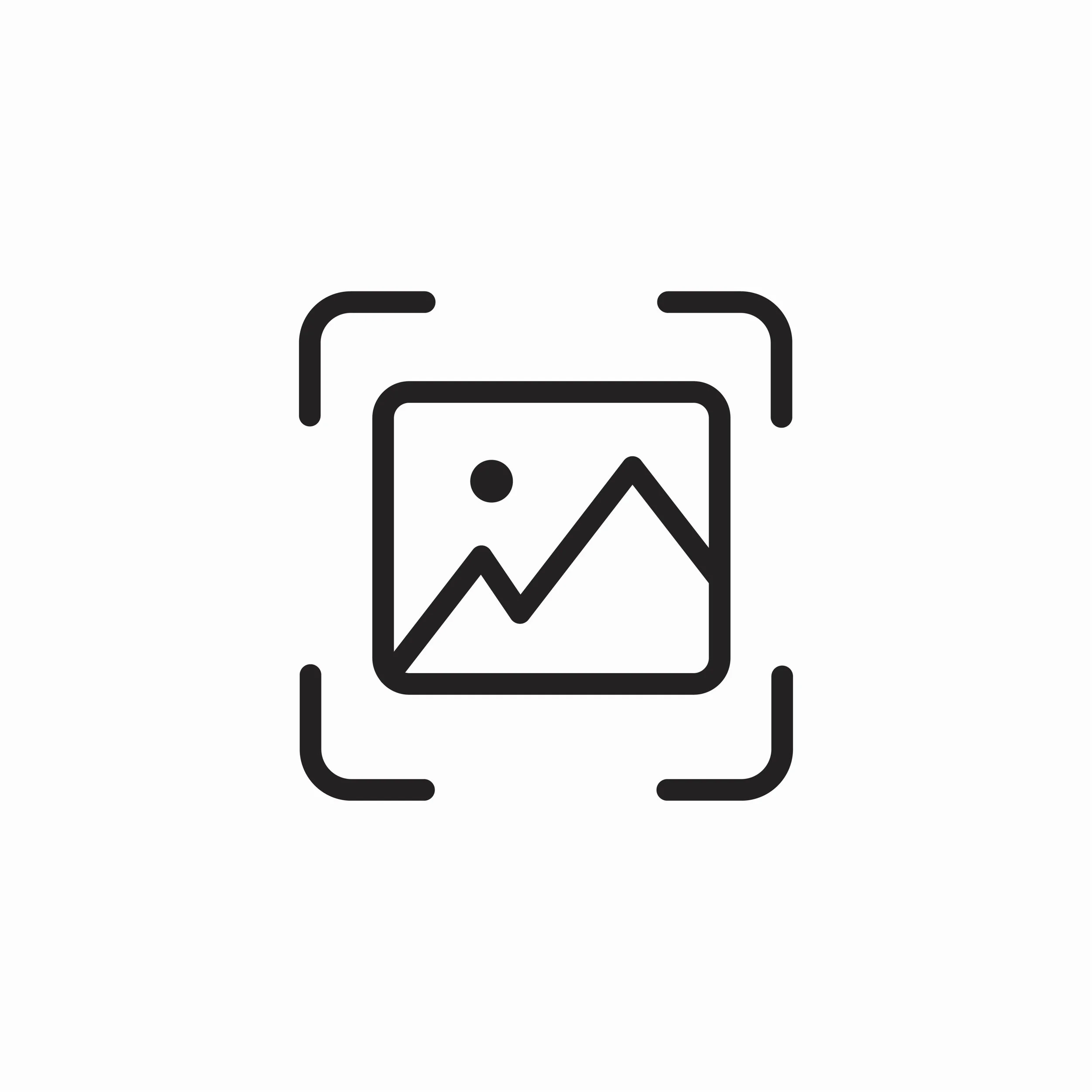 Icon representing image recognition or photo scanning, with a mountain and sun inside a square, surrounded by four corner brackets.