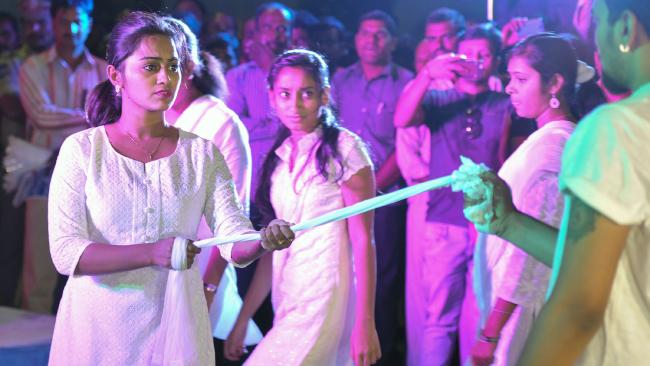 Indian youths perform a show in Hyderabad to promote awareness of sexual exploitation.