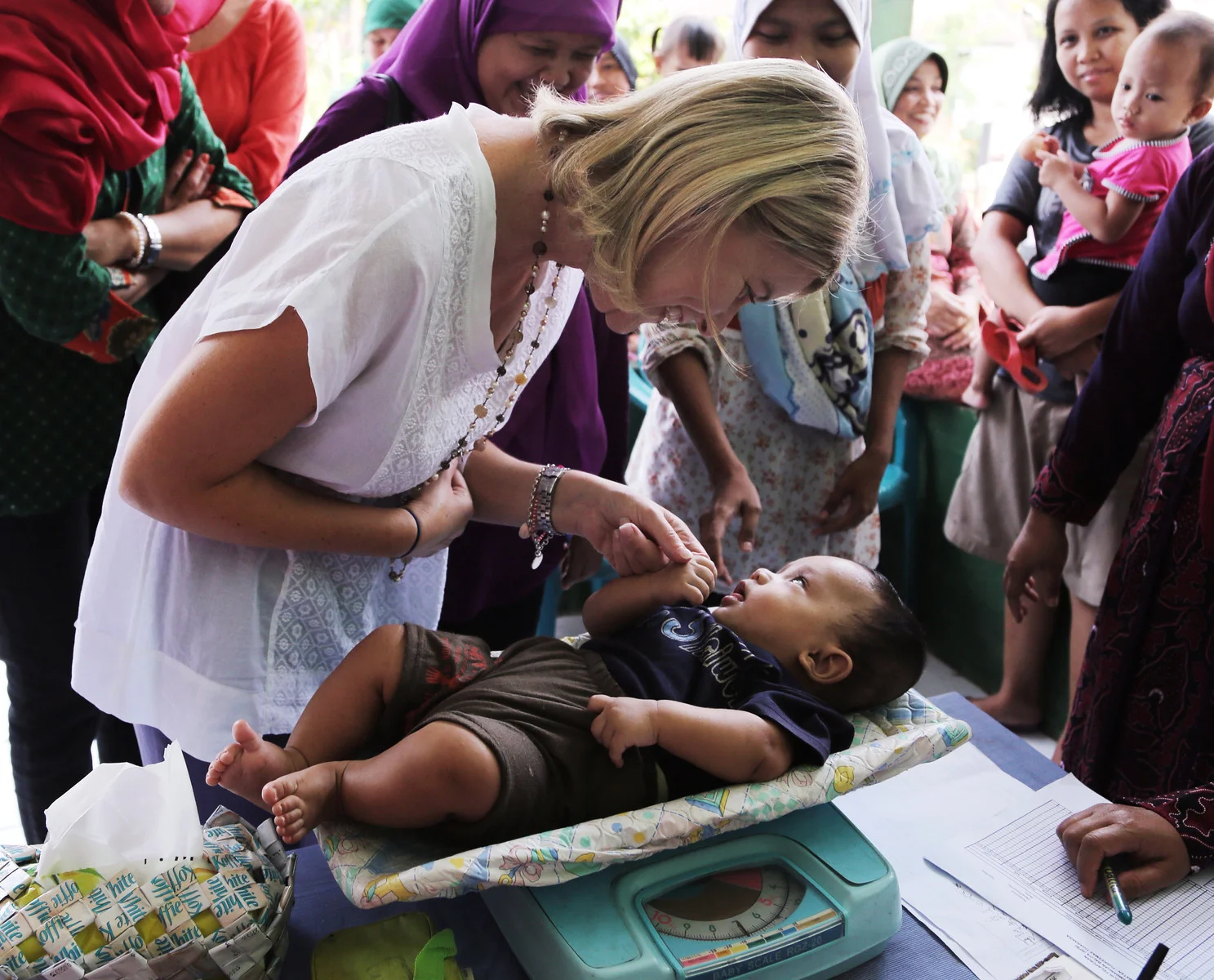 NSD shaking child's hand.jpg