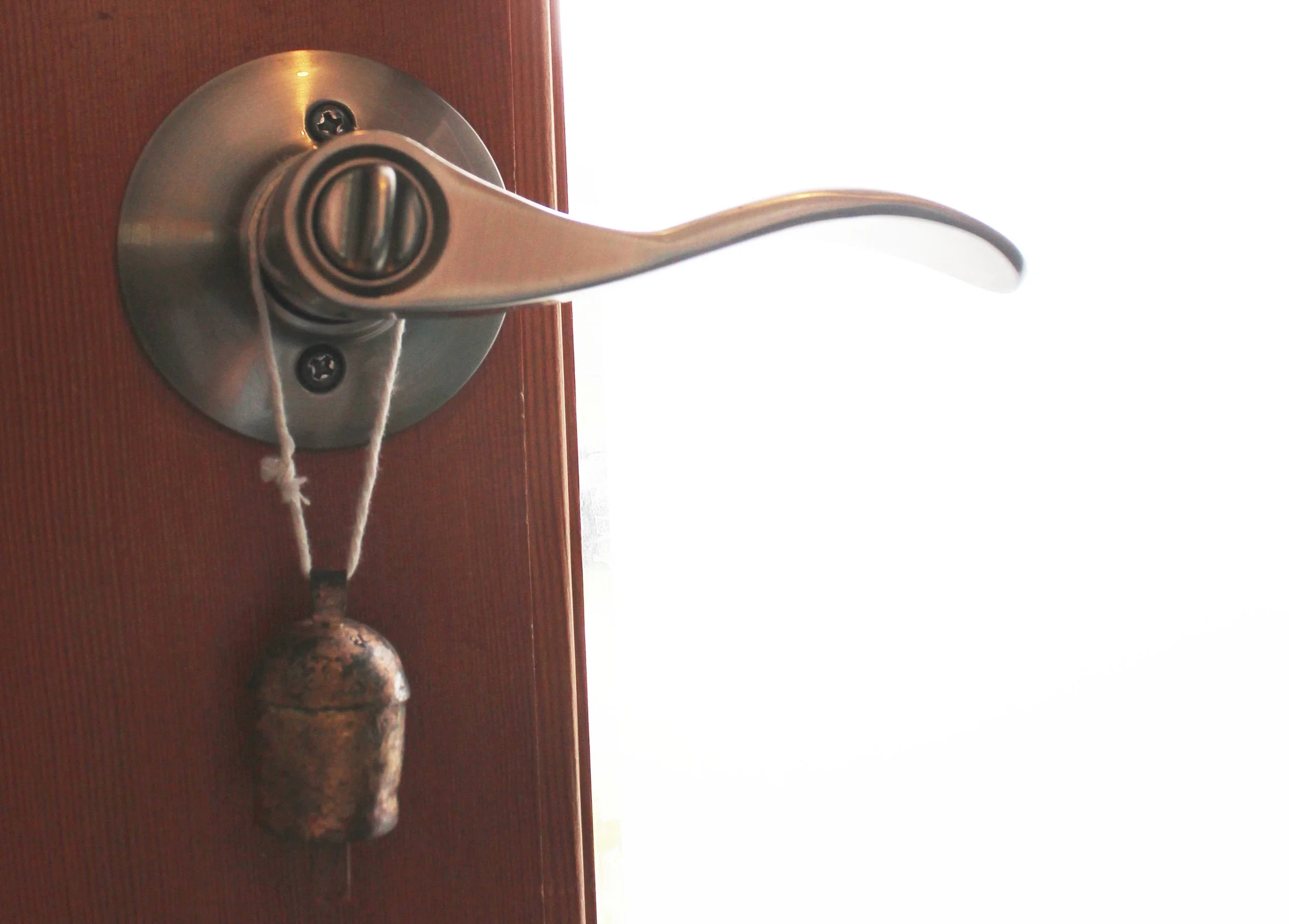 Happy Vesta Tip #2: add a bell Hang a bell (with a pleasant tone) on your front doorknob or handle. In feng shui, this works to protect your home, stimulate positive energy, and clear negative energy each time the bell sounds. I also use this bell as a simple reminder- every time I hear it, I remember to express gratitude to the universe for all of the abundance in my life. This little gold bell makes me feel lucky and wealthy every time I come home, or leave my house. 